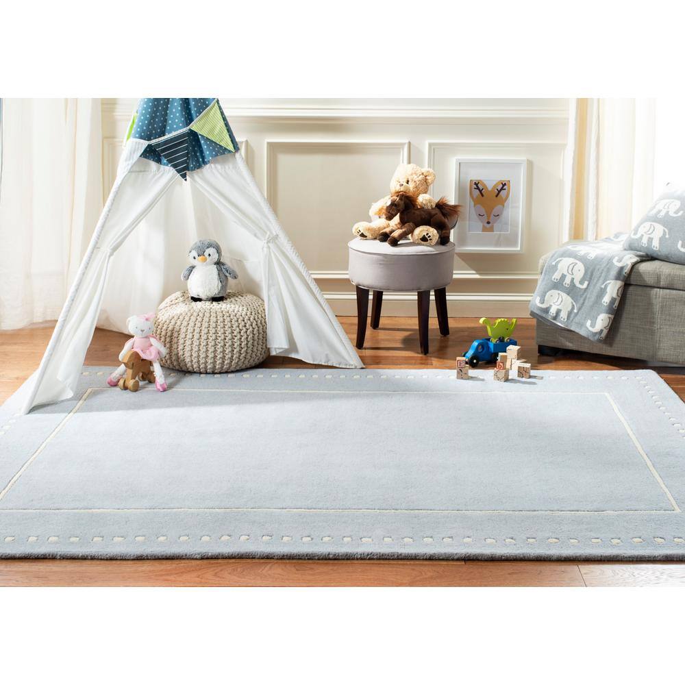 Hand-Tufted Ivory and Light Blue Wool Accent Rug 2' x 3'