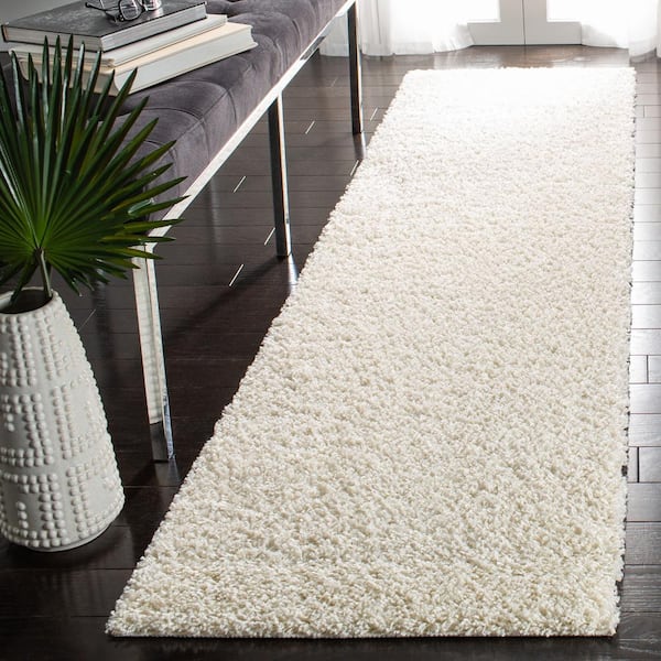 Primo Shag 2 ft. x 12 ft. Ivory Minimalist Solid White Runner Rug