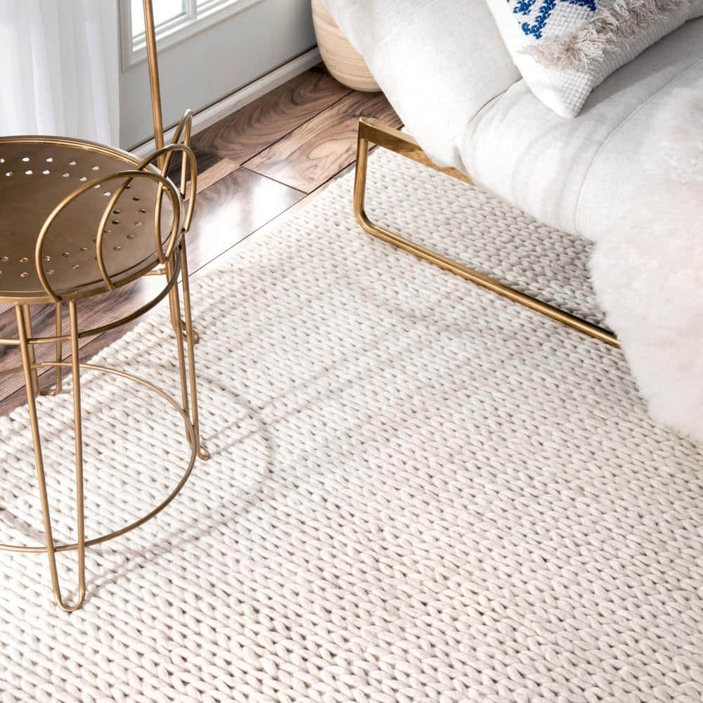 Off-White Braided Wool 6' x 9' Area Rug