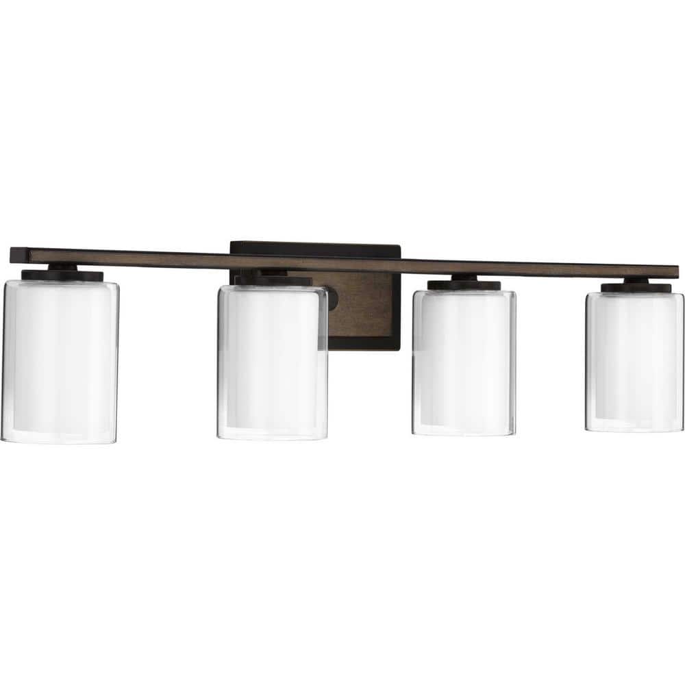 Antique Bronze Four-Light Bath Vanity with Clear Glass Shades
