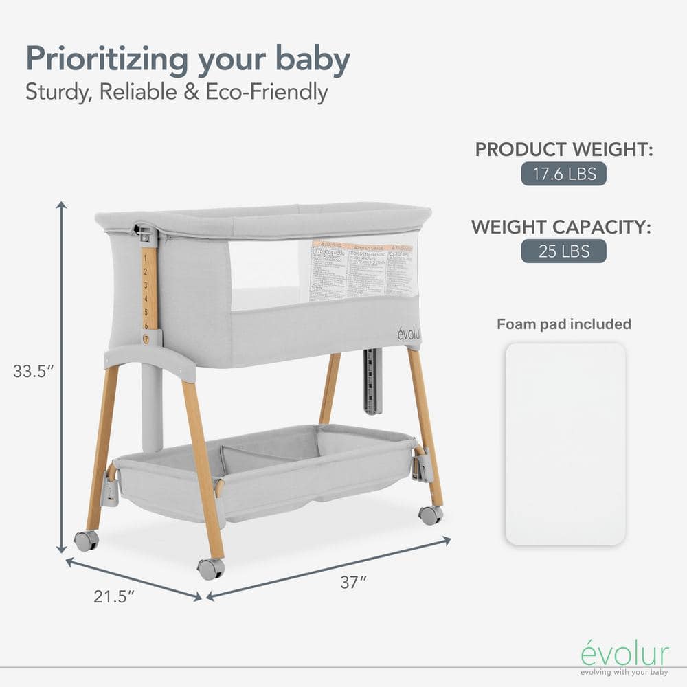 Light Gray Lullaby Portable Bassinet with wheels
