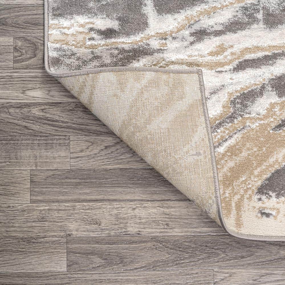 Beige and Ivory Abstract Marbled 8' x 10' Synthetic Area Rug
