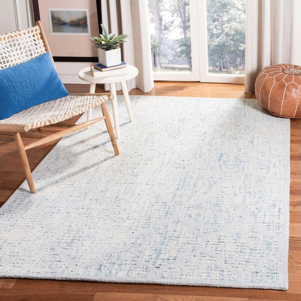 Abstract Ivory/Turquoise Doormat 2 ft. x 3 ft. Distressed Quatrefoil Area Rug