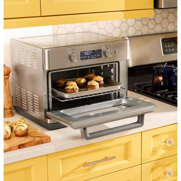 https://images.thdstatic.com/productImages/7c68e60c-cf83-4290-8647-315384be0109/svn/stainless-steel-ge-toaster-ovens-g9oaaasspss-4f_600.jpg
