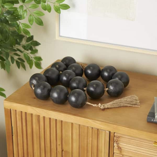 Litton Lane Black Handmade Mango Wood Round Extra Long Orb Garland with Tassel with Knotted Brown Jute Decorative Balls