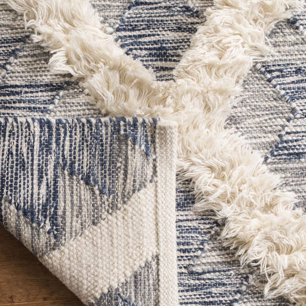 Ivory and Blue Hand-Knotted Wool 6' x 9' Area Rug