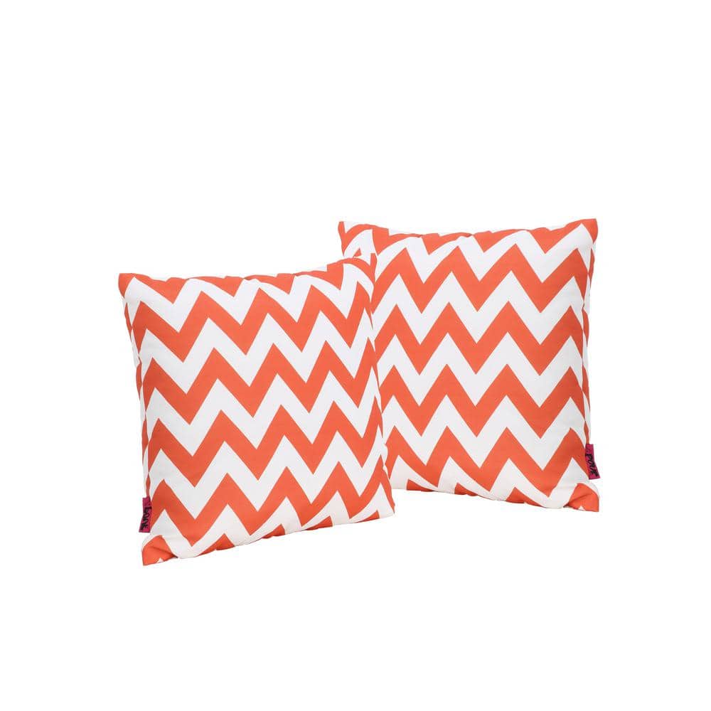 Noble House Ernest Orange and White Zig Zag Striped Polyester 18 in. x 18 in. Throw Pillow (Set of 2) These plush patterned pillows are a great way to add some fresh color to any room in your home. Use them in the living room, dining room or even your bed room. You can't go wrong with adding color and these throw pillows were made just for that. They are sure to be the perfect addition to any set. Color: Orange and White.