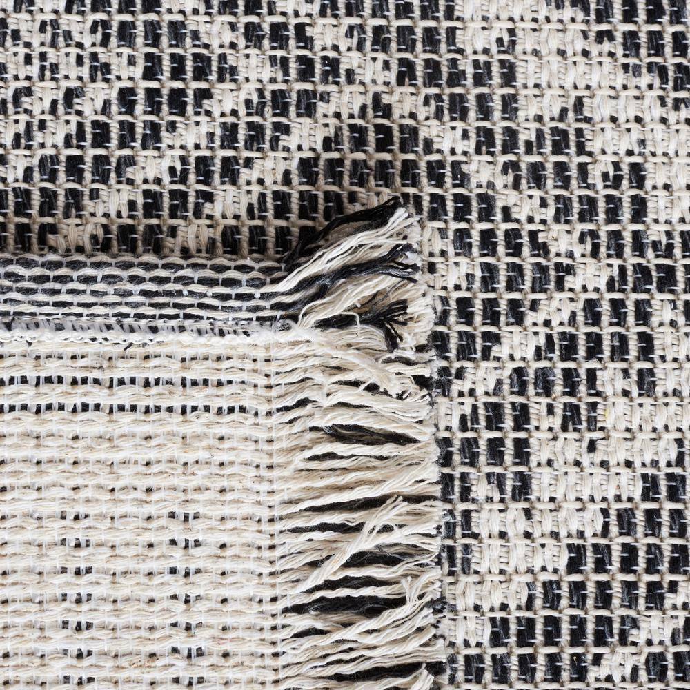 Augustine Black and Ivory Geometric Synthetic Area Rug, 6'4" x 9'6"