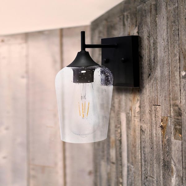 1-Light Black Wall Sconce with Seeded Glass Shade