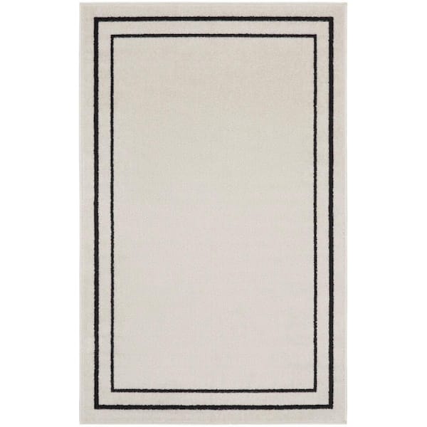 Nourison Nourison Essentials Ivory/Black 2 ft. x 4 ft. Solid Contemporary Area Rug