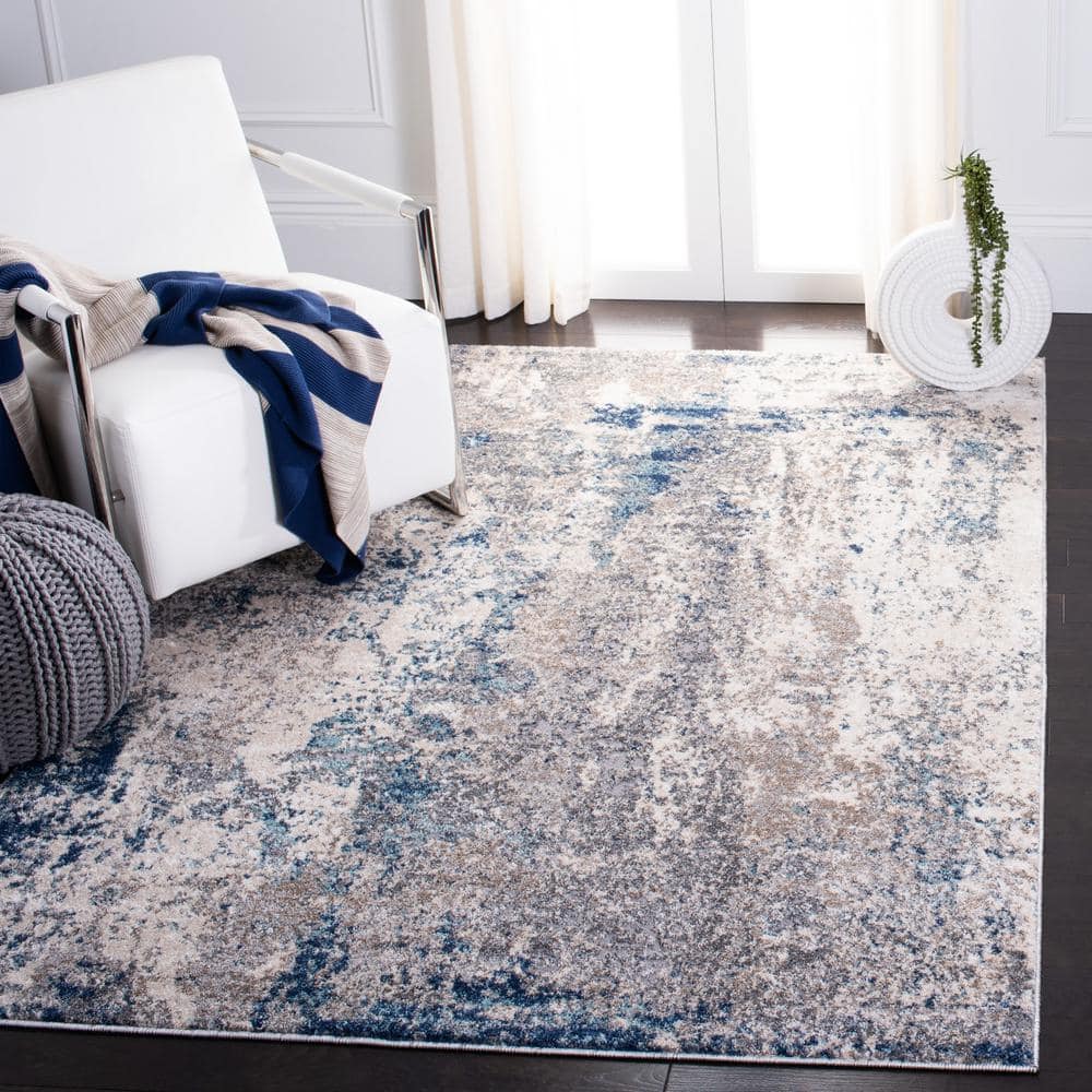 4' x 6' Gray and Navy Abstract Synthetic Area Rug