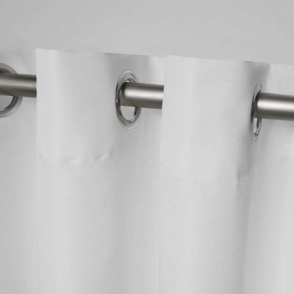 Canvas Winter White Solid Light Filtering Grommet Top Indoor/Outdoor Curtain, 54 in. W x 84 in. L (Set of 2)