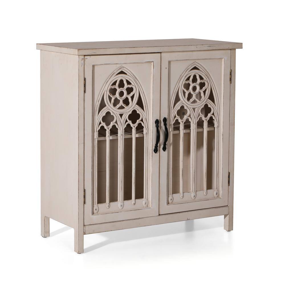 White accent storage cabinet with Gothic arch design.