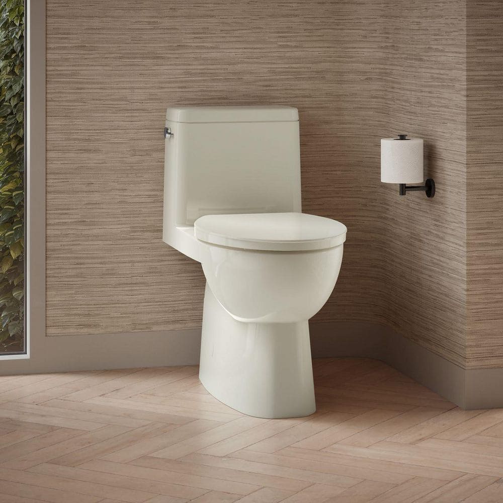 KOHLER Reach 12 inch 1-piece 1.28 GPF Single Flush Elongated Toilet in Biscuit Seat Included