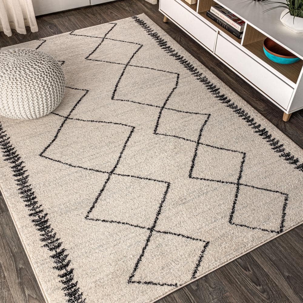Zaina 8' x 10' Black and Cream Geometric Synthetic Area Rug