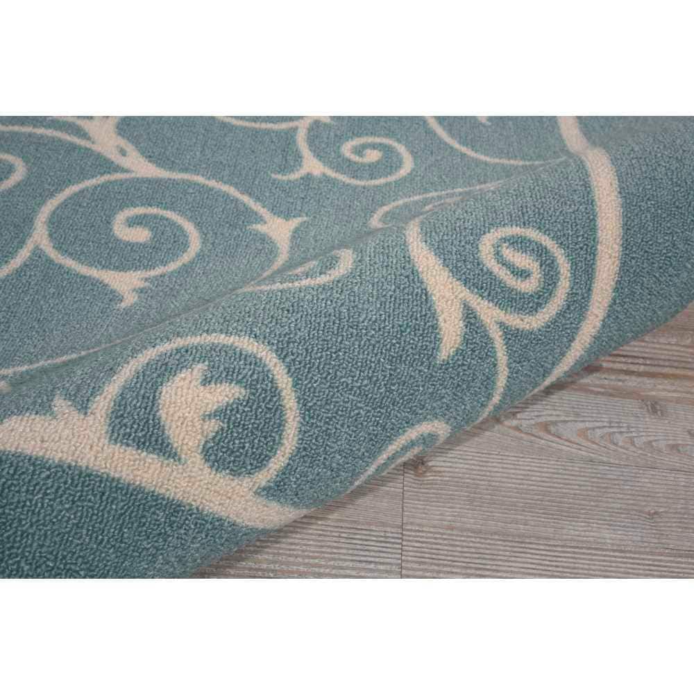 Light Blue Floral Synthetic Indoor/Outdoor Area Rug 4' x 6'