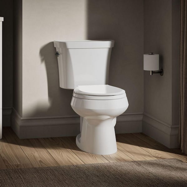 Wellworth 12 in. Rough In 2-Piece 1.1 GPF Dual Flush Round Toilet in White Seat Not Included