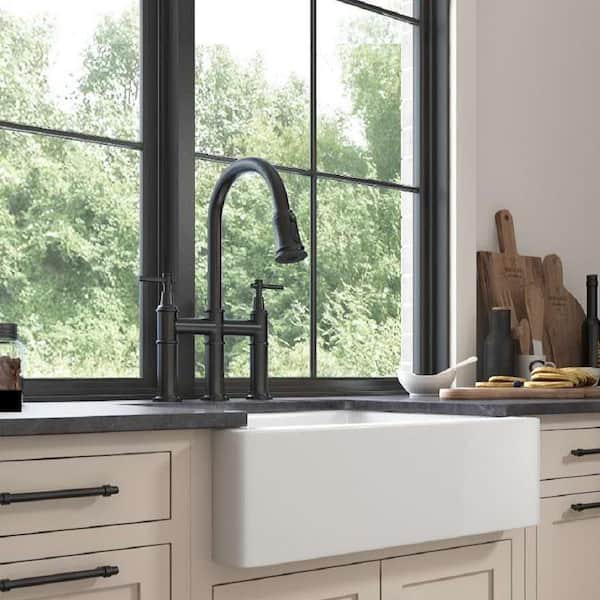 https://images.thdstatic.com/productImages/7d05ddda-f263-4f9f-b49f-0542bd0c21c6/svn/white-toolkiss-farmhouse-kitchen-sinks-dl01-620-1f_600.jpg