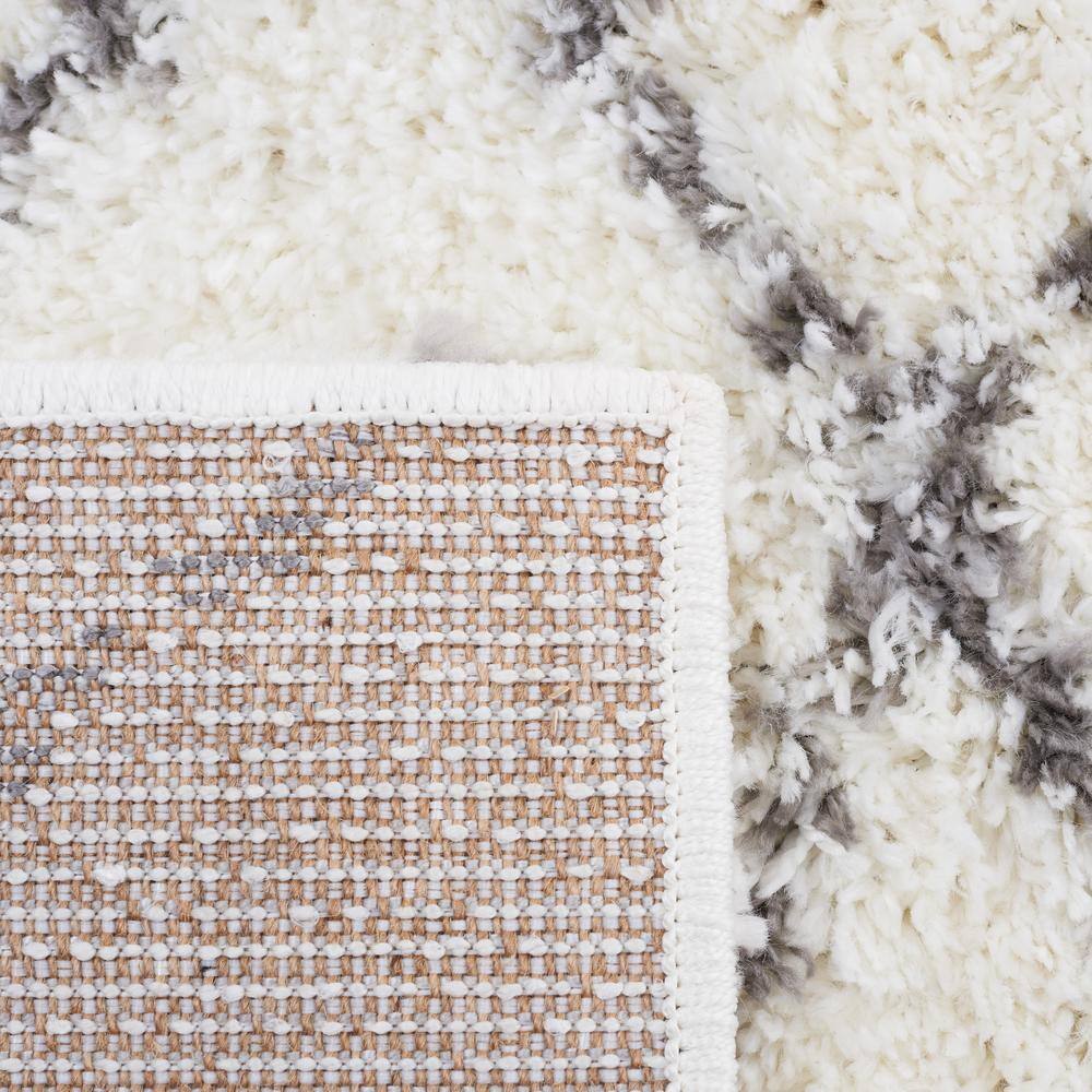 Cream and Light Grey 8' x 10' Shag Synthetic Area Rug