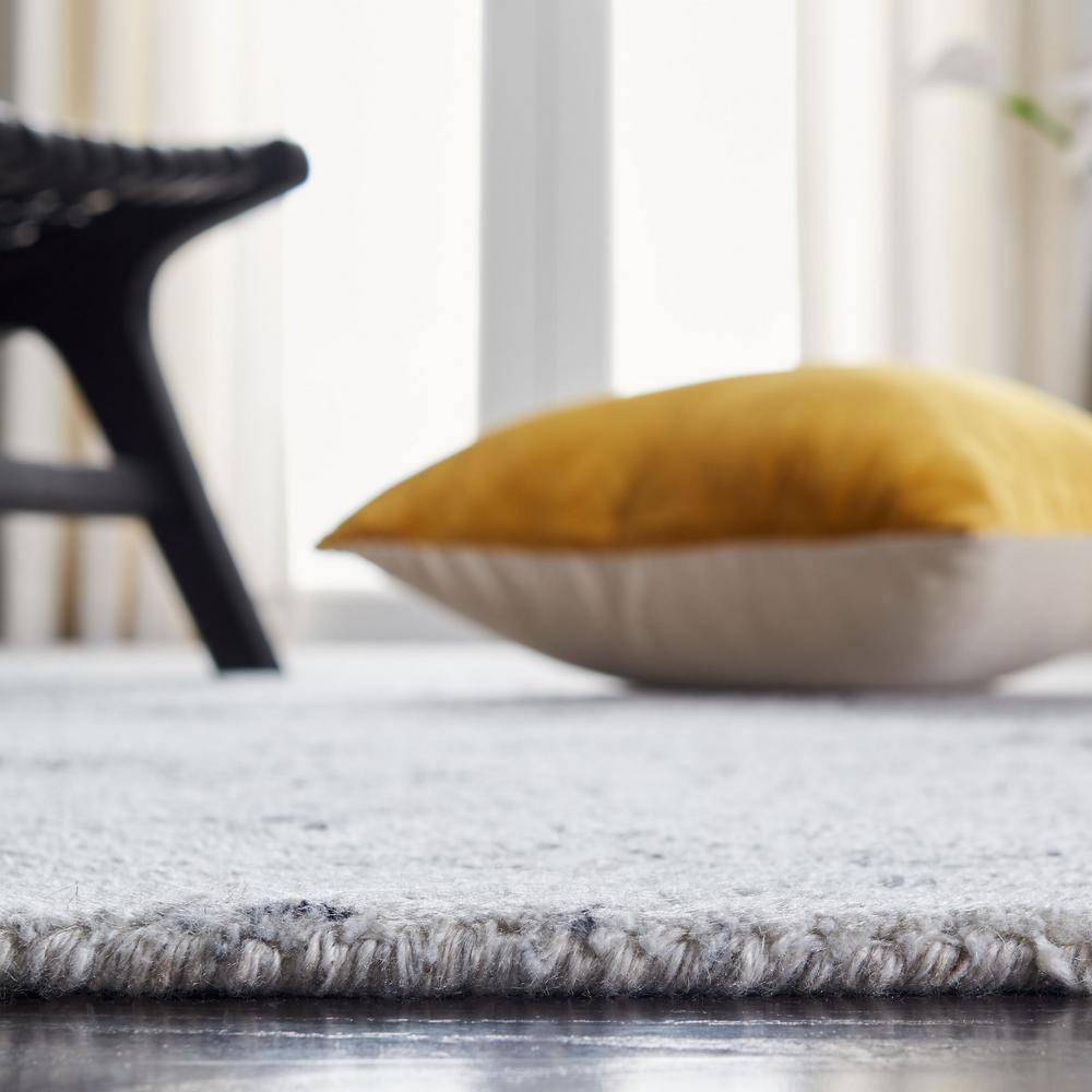 Black and Ivory Abstract Hand-Tufted Wool Area Rug