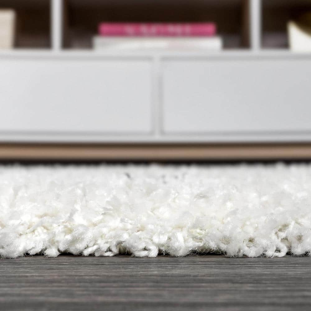 4' x 6' Grey and Ivory Synthetic Shag Area Rug