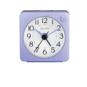 The Violet 2.2 in. travel alarm clock in violet, ultra small with snooze alarm and lighted dial