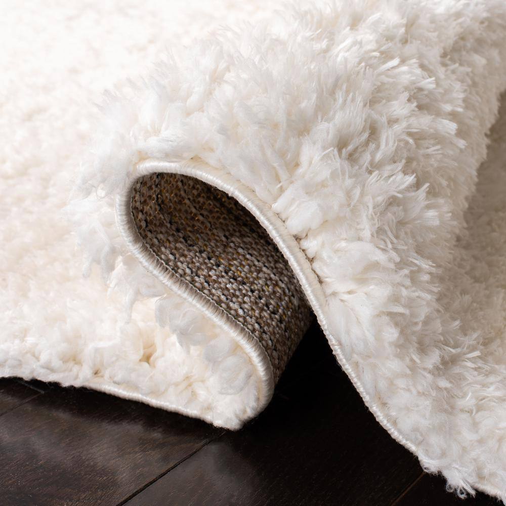 Ivory Solid Shag 8' x 10' Wool and Synthetic Area Rug