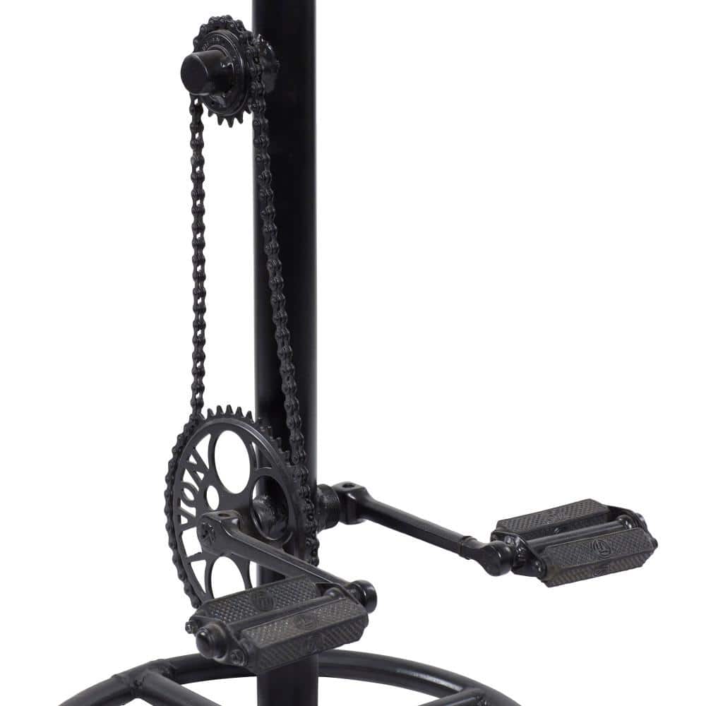 Close-up detail of the metal frame and pedal mechanism of a bar stool.