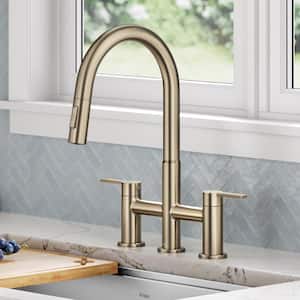 Oletto Double Handle Bridge Kitchen Faucet with Pull-Down Sprayhead in Spot-Free Antique Champagne Bronze