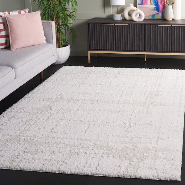 Rumi Shag 9 ft. x 12 ft. Ivory/Light Beige Distressed Solid Area Rug