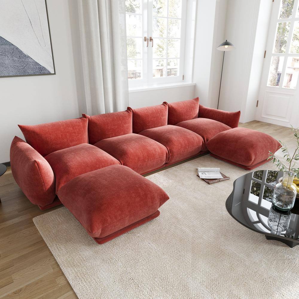 Perspective view of an orange U-shaped modular chenille sectional sofa.