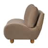Side view of a mocha velvet upholstered slipper chair with curved edges.