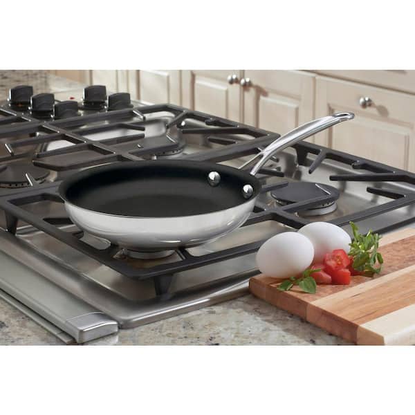 https://images.thdstatic.com/productImages/7d6c61a2-2f33-4479-b804-ecb80a7de621/svn/stainless-steel-cuisinart-skillets-722-20ns-76_600.jpg