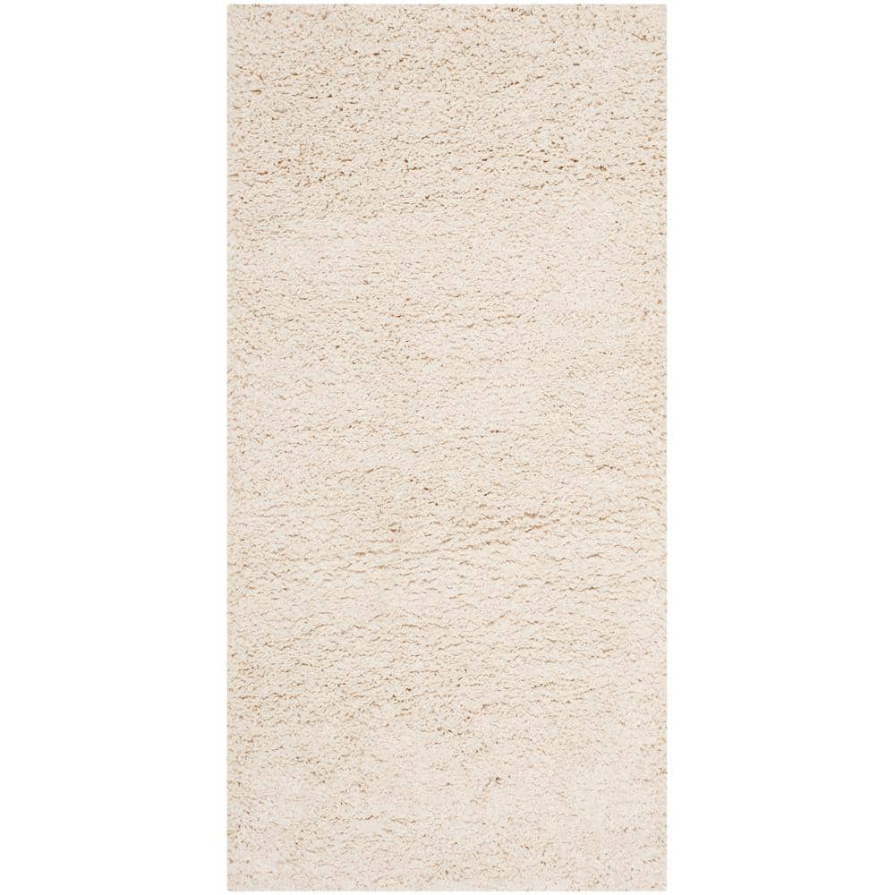 Milan Shag 2 ft. x 4 ft. Ivory Solid Area Rug price history on PriceWatchPro