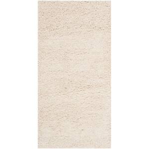 Milan Shag Ivory 2 ft. x 4 ft. Solid Area Rug