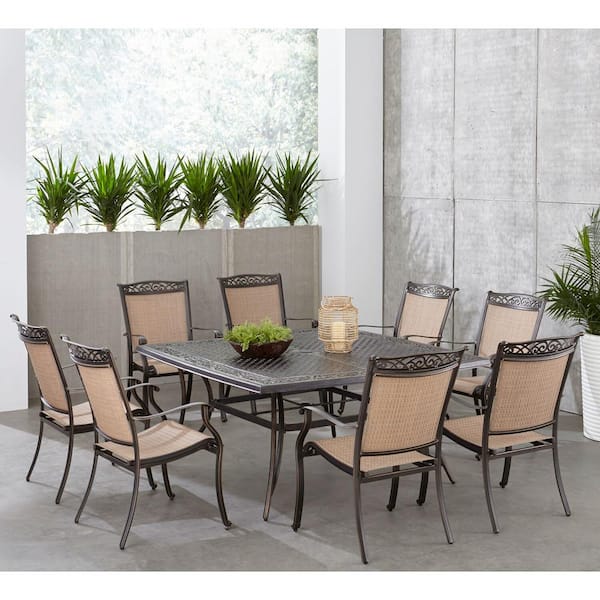Hanover Fontana 9-Piece Aluminum Outdoor Dining Set with 8 Sling Chairs and a 60 in. Square Cast-Top Table