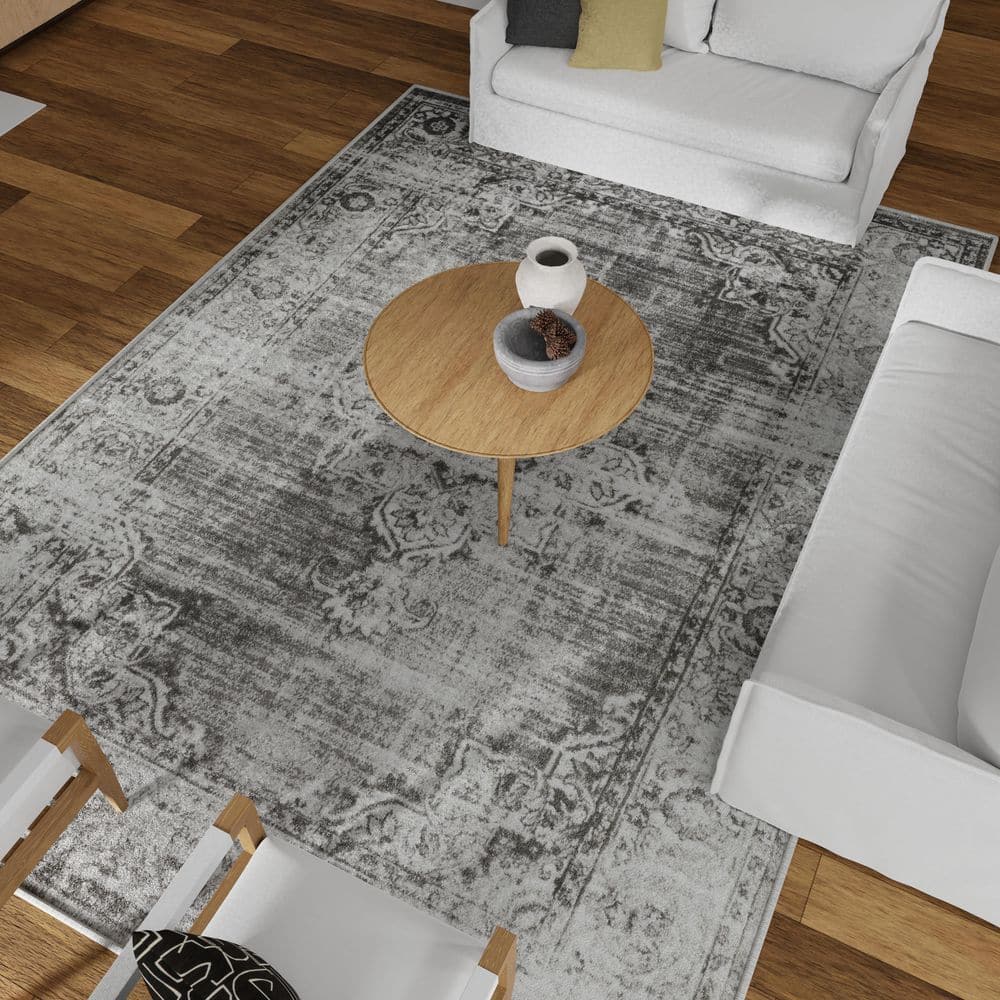 Ivory and Gray 9' x 12' Synthetic Oriental Rug