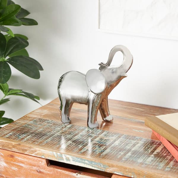 Litton Lane 4 in. x 10 in. Silver Ceramic Standing Elephant Sculpture