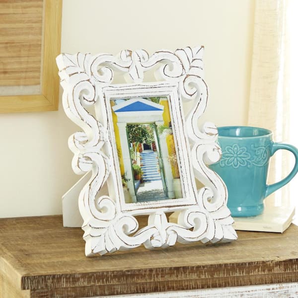 Litton Lane 4" x 6" White Handmade Intricate Carved Scroll Mango Wood Photo Frame