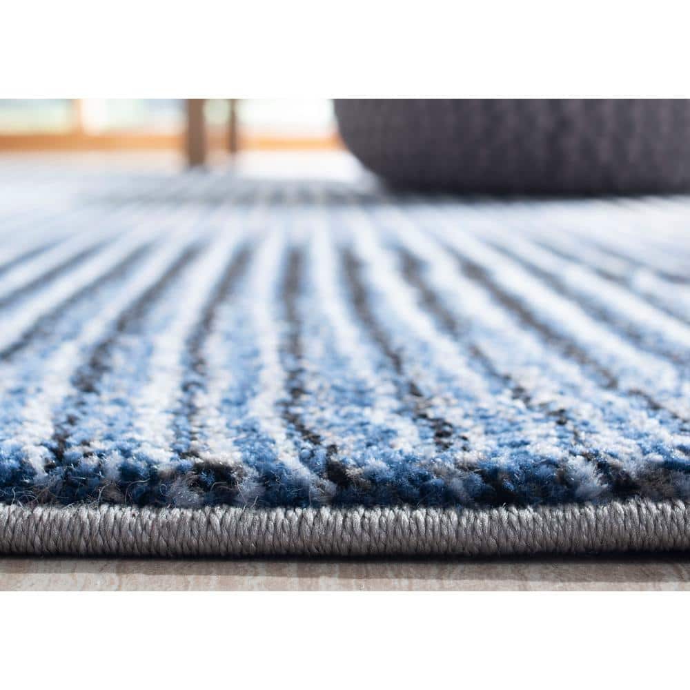 Celestial Blue Abstract 9' x 12' Synthetic Easy-Care Area Rug