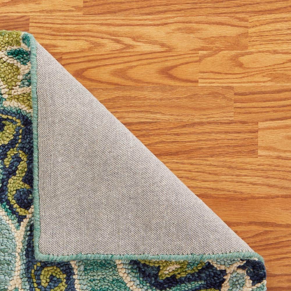 Handmade Blue and Green Floral Wool Round Area Rug