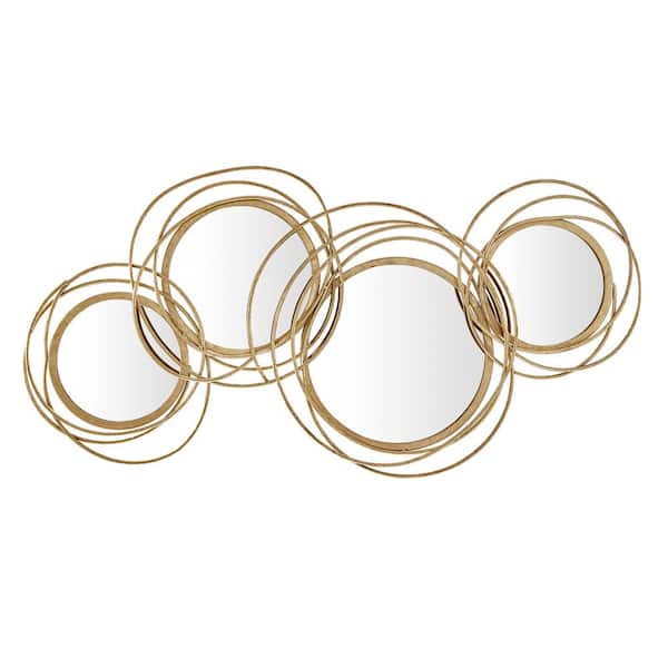 FirsTime & Co. 41 in. H x 19.5 in. W Round Metal FirsTime & Co. Gold Gabrielle Swirl Modern Framed Mirror