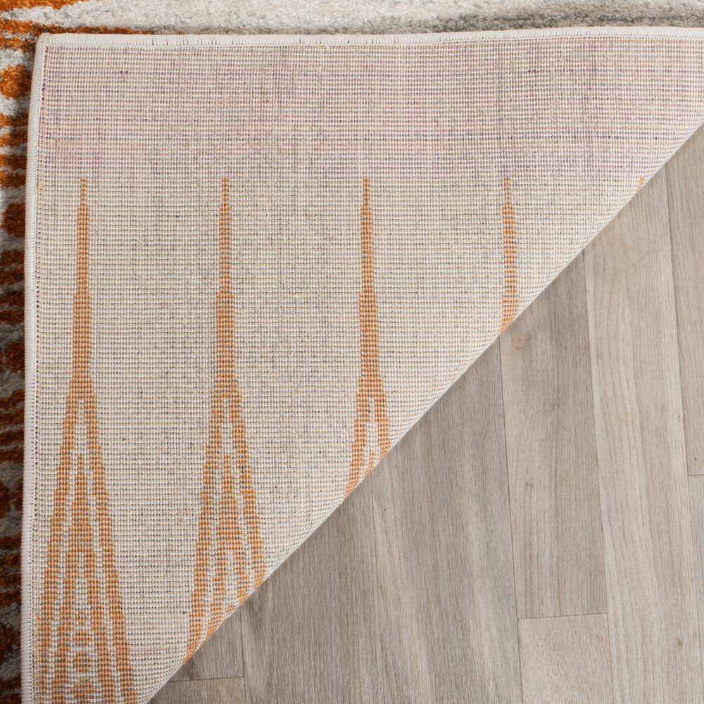 Ivory and Burnt Orange Bohemian Wool Area Rug