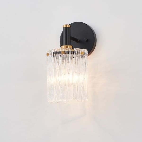 1-Light Painted Black and Plated Brushed Gold Wall Sconce with Textured Glass Shade