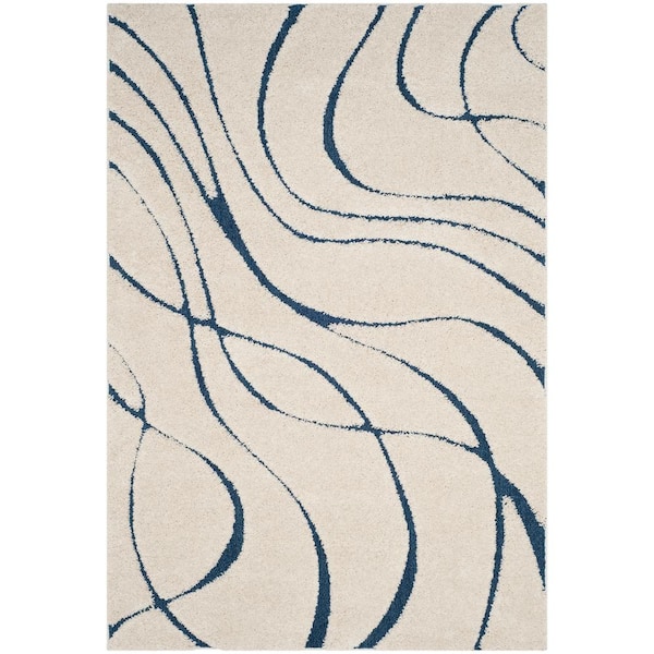 SAFAVIEH Florida Shag Cream/Blue 4 ft. x 6 ft. Solid Area Rug