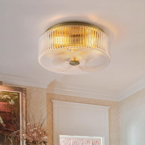 Aspen 13.9 in. 3-Light Brass Flush Mount Ceiling Light with Clear Ribbed Glass Drum Shade