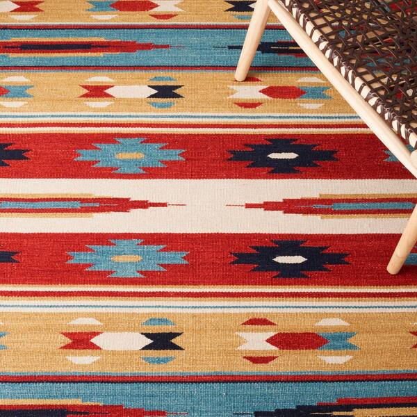 https://images.thdstatic.com/productImages/7ddd3fb8-f924-4643-bf52-63e4fdb737ad/svn/beige-red-safavieh-area-rugs-klm712a-5-44_600.jpg
