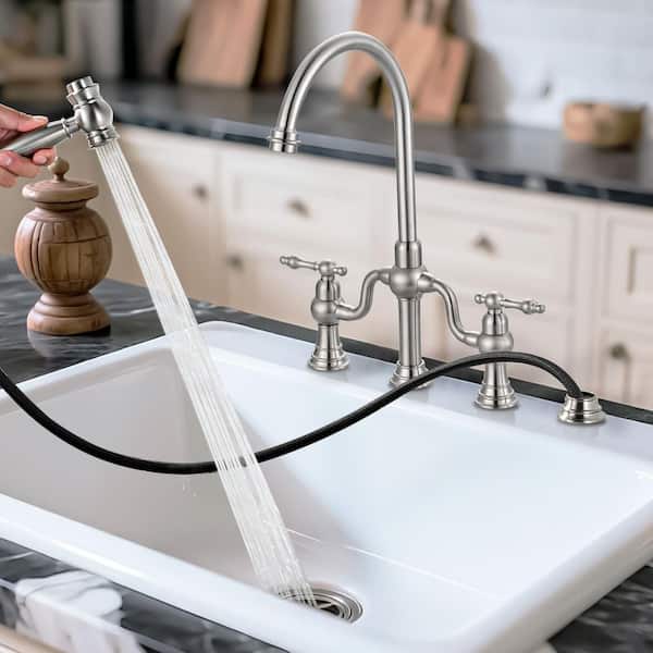 Double Handle High Arc Brass Bridge Kitchen Faucet with Side Sprayer in Brushed Nickel