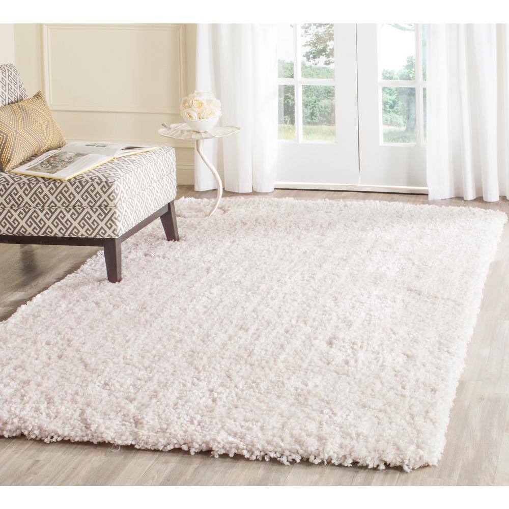 Ivory Handmade Tufted Shag Area Rug, 8' x 10'