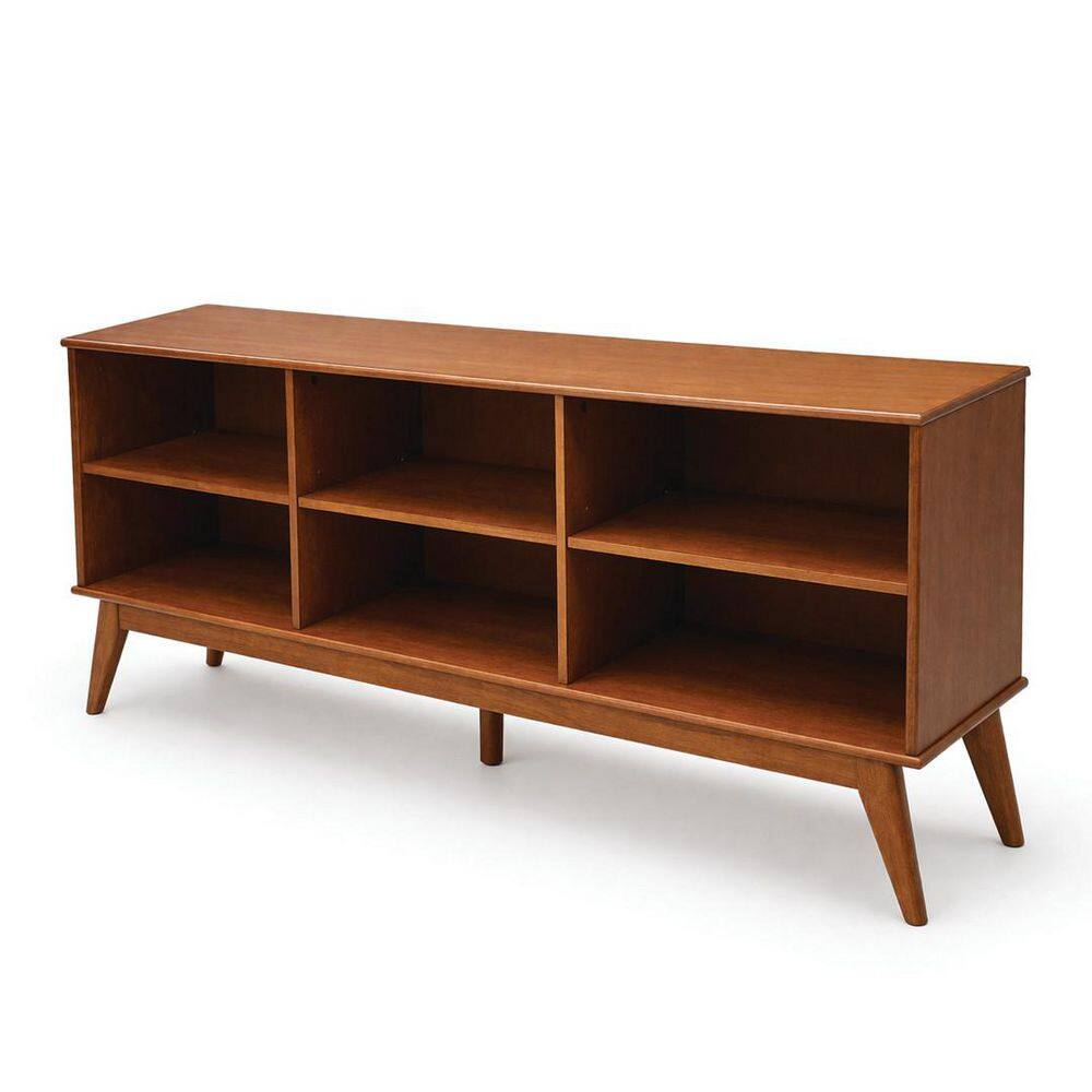 Teak brown solid wood mid-century bookcase with six shelves and tapered legs.